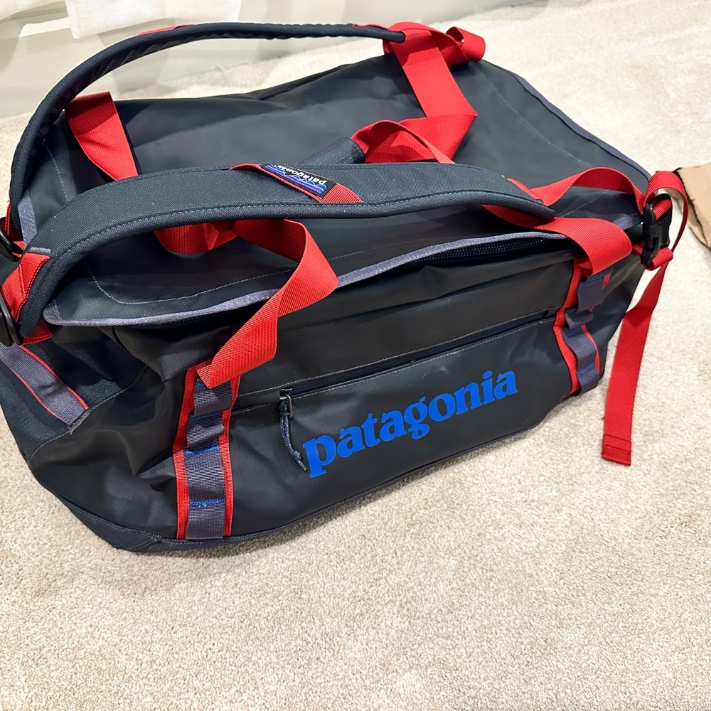 Patagonia Navy and Red Duffel Bag